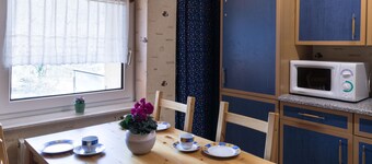 Comfortable attic apartment in country house style with balcony and free WiFi