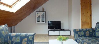 Comfortable attic apartment in country house style with balcony and free WiFi