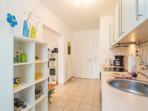 Fridge, oven, dishwasher, high chair