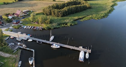 Comfortable, affordable, quiet, located at the harbor and surrounded by meadows, pets welcome