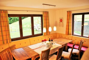 Dining - Holiday home Sonnhof am Walchsee in Tyrol, near the lake, lake view, garden, play area (Kössen)
