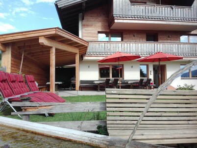 Holiday home Sonnhof am Walchsee in Tyrol, near the lake, lake view, garden, play area