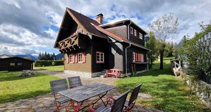 cozy house in a sunny place with a fantastic mountain panorama
