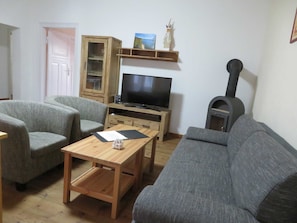 Fernseher, Kamin