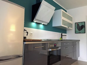 Refrigerador, microondas, horno y parrilla de estufa