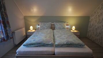 2 dormitorios, tabla de planchar con plancha, cuna de viaje y wifi