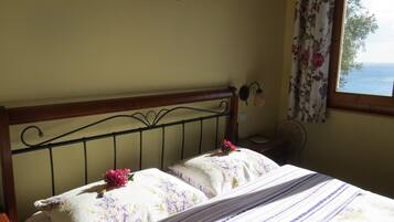 2 dormitorios, caja fuerte, tabla de planchar con plancha