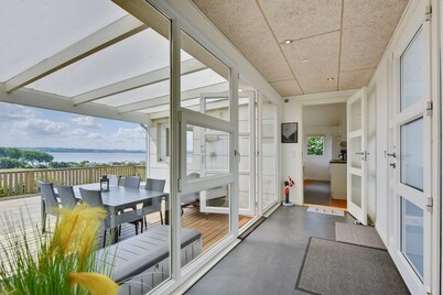 Family-friendly holiday home with a panoramic view of the Aabenraa Fjord