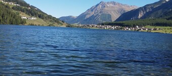 Beautiful wooden hut with a cozy fireplace, stone pine parlor and stone pine bed