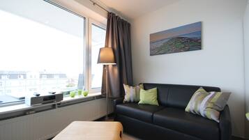 Una Smart TV, un reproductor estéreo