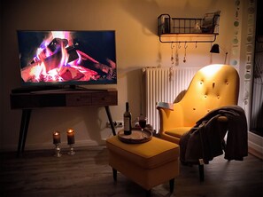 Fernseher, Videospiele, DVD-Player, Bücher