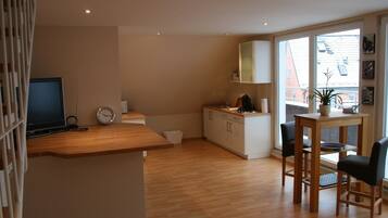 Duplex | Living area | Flat-screen TV