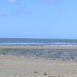 On the beach, sun loungers