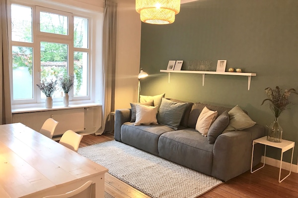 Wohnzimmer zum Innenhof mit Schlafsofa (160x200)