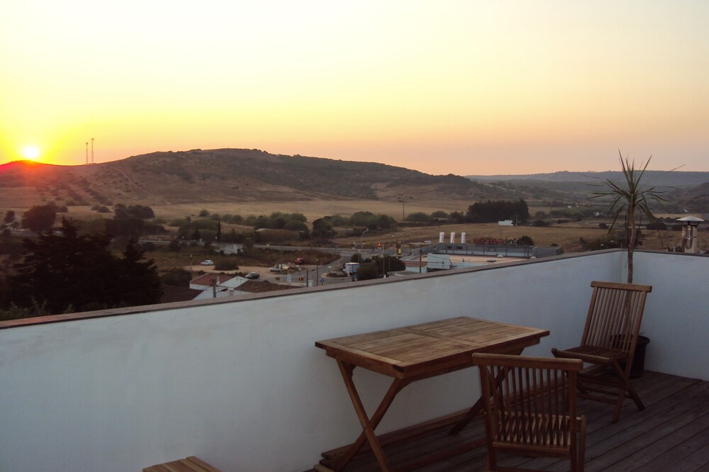 Small multi-storey house with beautiful roof terrace, involved in village life
