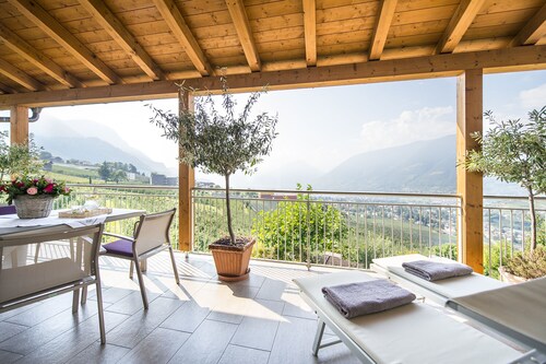 Exclusive vacation apartment above the rooftops of Merano with a fantastic mountain panorama