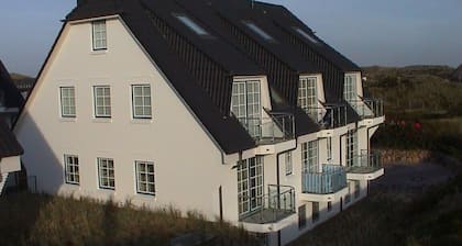 Exklusive Ferienwohnung nahe des Strandes in einer traumhaften Dünenlandschaft m