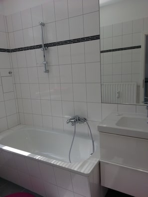 Hair dryer, towels, soap, toilet paper