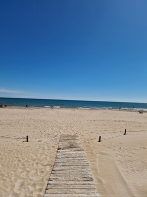 On the beach, sun loungers
