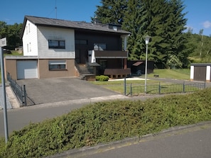 Stunning two-story building with a flat roof and inviting front entrance.