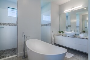 Bathtub, hair dryer, towels