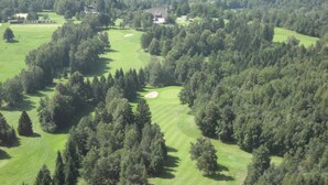 A golf course surrounded by dense forest. - Best starting point for bikers, hikers, mushroom and nature lovers in the national park  (Bohinj -Koprivnik)