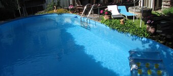 Vacation apartment for up to 6 people with sunny courtyard, garden and pool