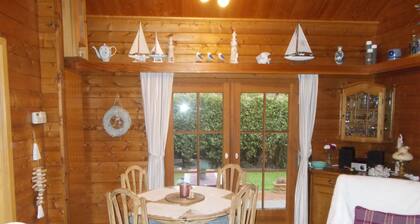 Partly log house style with 700 sqm natural garden, quiet area
