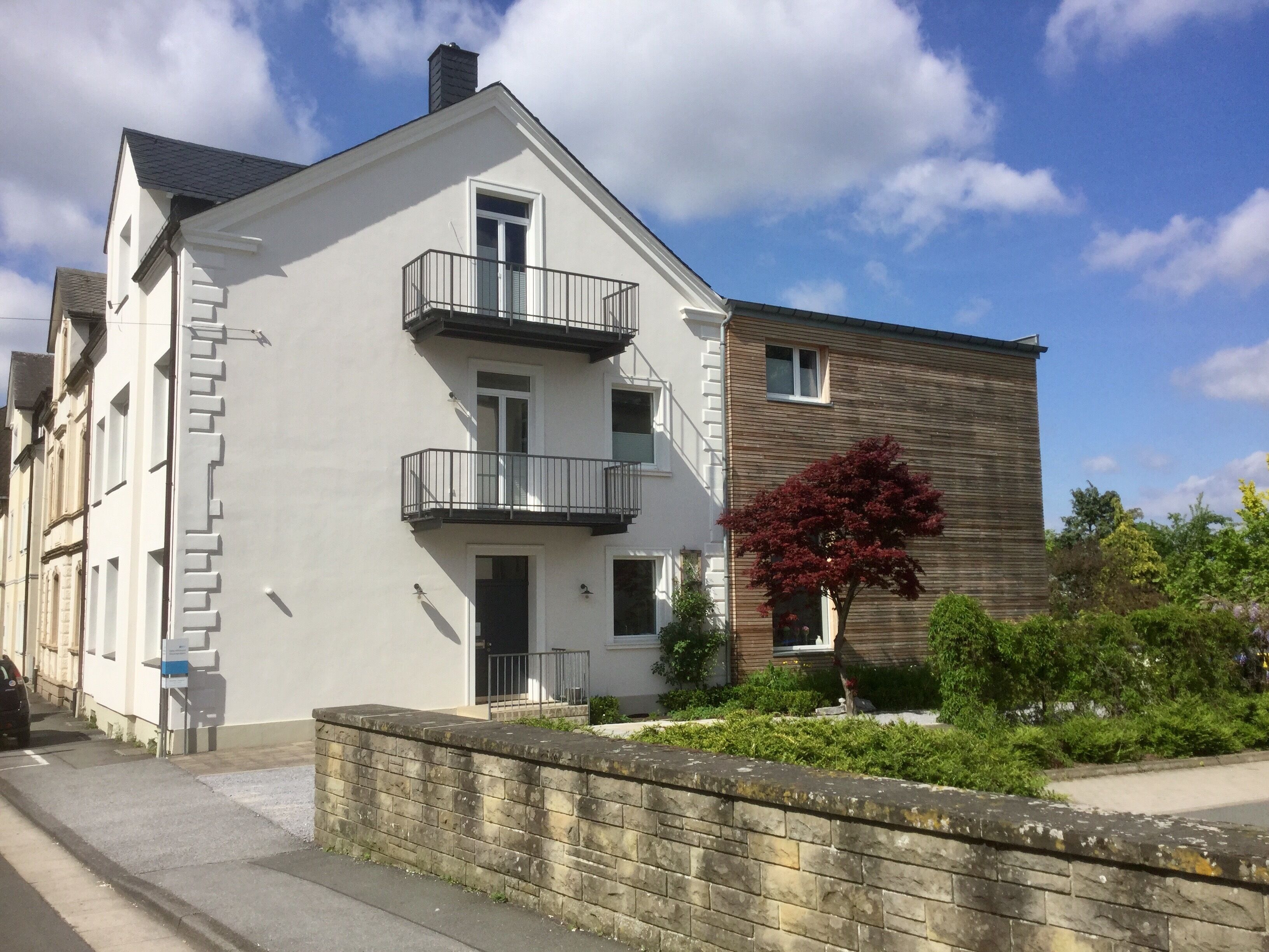 Living in a renovated 1907 town house with garden and pool