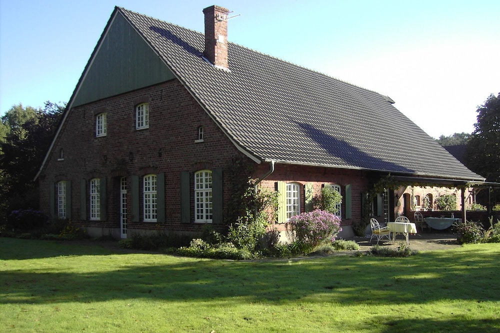 idyllic old farm by the pond with a large garden and loggia