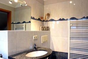 Bathtub, hair dryer, soap