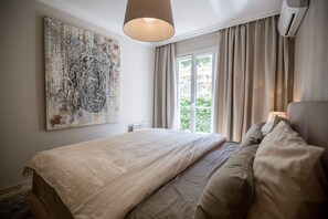2 slaapkamers, een strijkplank/strijkijzer, wifi, beddengoed