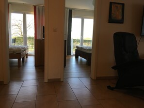 2 bedrooms, in-room safe, iron/ironing board, travel cot