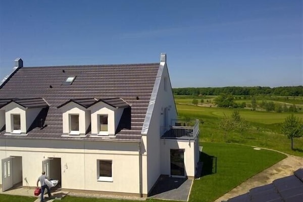 Haus mit Blick über den Golfplatz bis zum Fleesensee