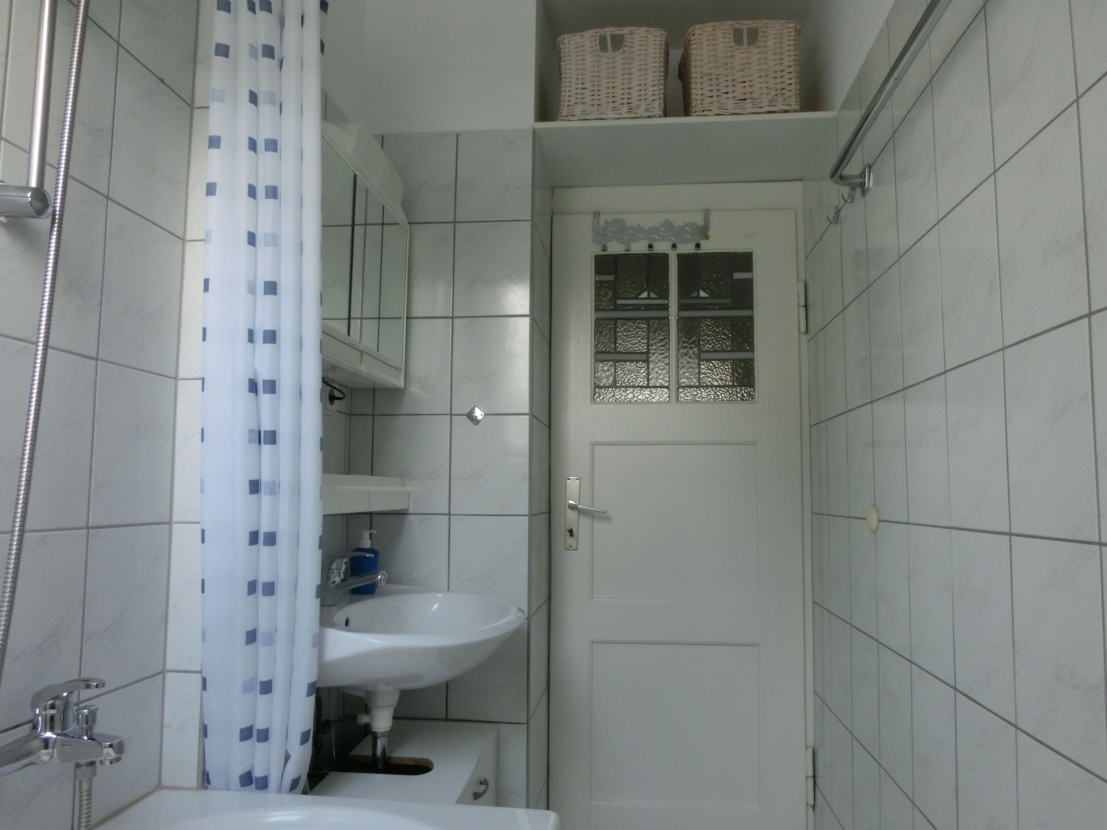 Combined shower/tub, hair dryer, towels, soap