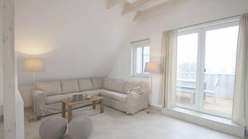 Télévision à écran plat, lecteur de DVD, vidéothÚque, chaßne hi-fi