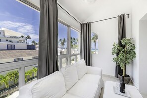 Deluxe Penthouse, 6 Bedrooms, Ocean View | Living room | TV - Flor Del Mar Condo (Punta Cana)