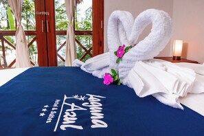 Deluxe Room | Memory foam beds, bed sheets