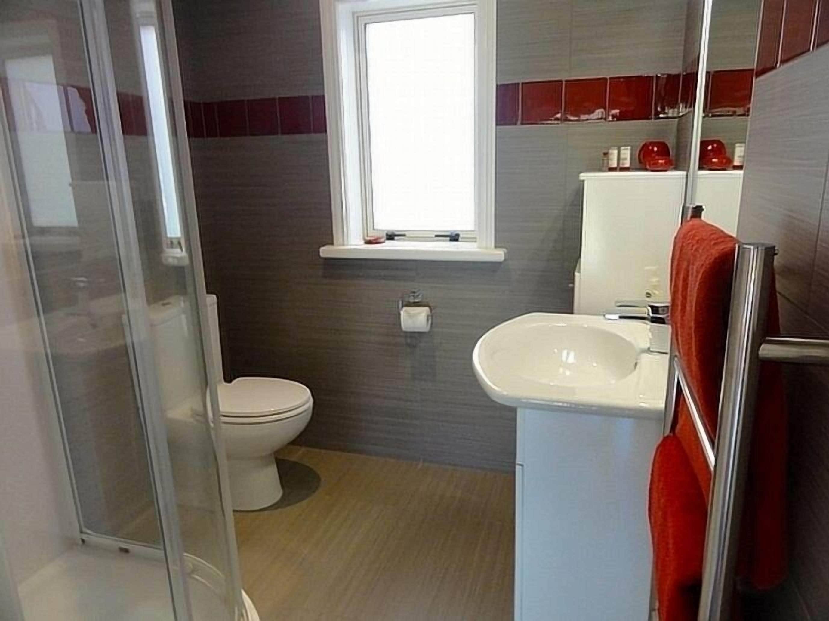 Shower, hydromassage showerhead, bathrobes, towels