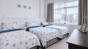 2 bedrooms, premium bedding, memory-foam beds, laptop workspace