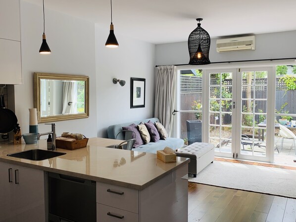 Family Townhome, 2 Bedrooms | Living area | Flat-screen TV - Uptown City Haven (Christchurch)