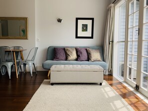 Family Townhome, 2 Bedrooms | Living area | Flat-screen TV