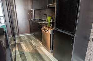 Apartment | Private kitchenette | Full-sized fridge, oven, stovetop, dishwasher