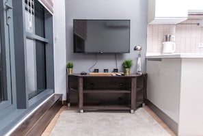 Apartment, 1 Bedroom | Living area | LED TV