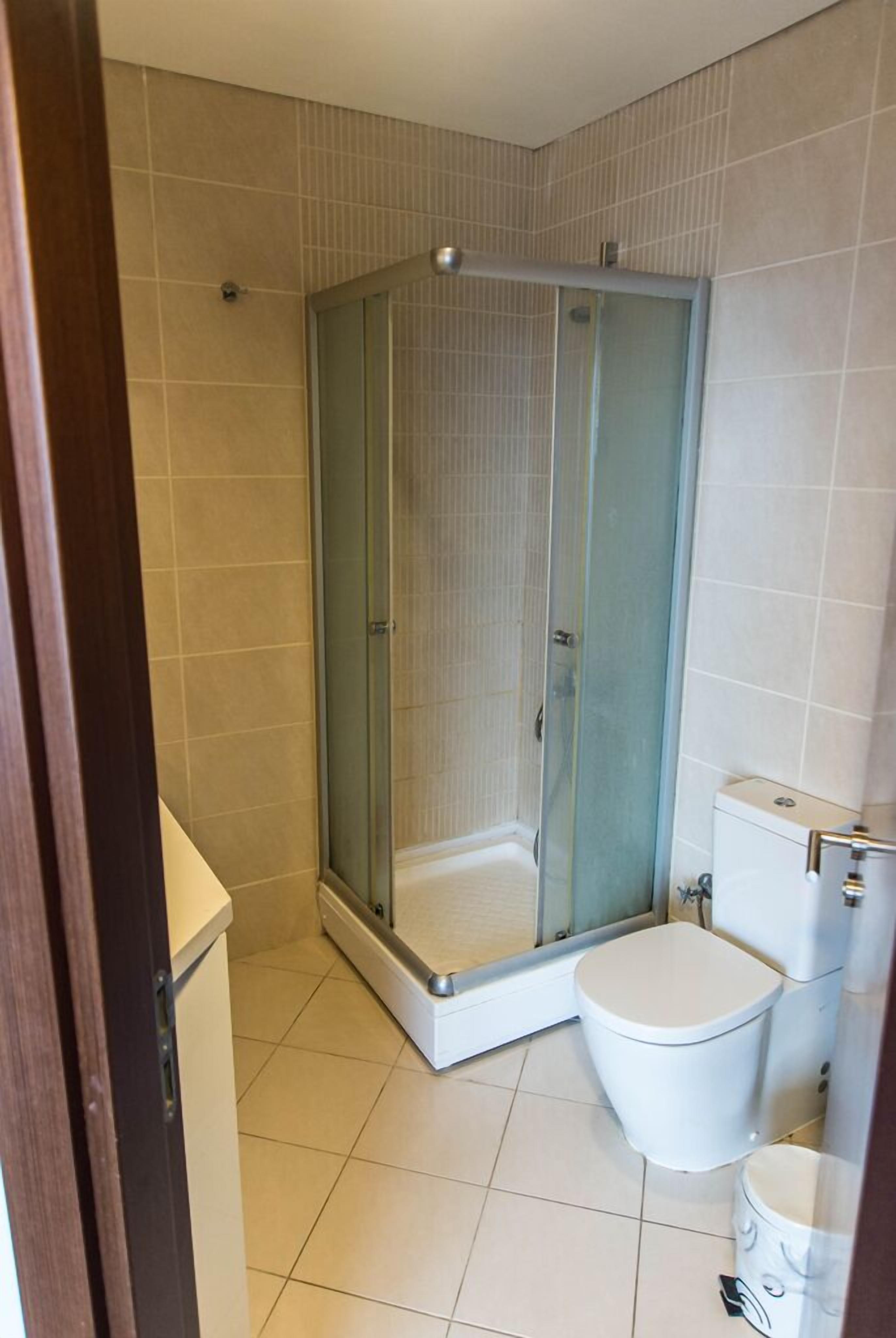 Apartment, 1 Bedroom | Bathroom | Shower, free toiletries, hair dryer, towels