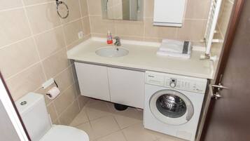Apartment, 2 Bedrooms | Bathroom | Shower, free toiletries, hair dryer, towels