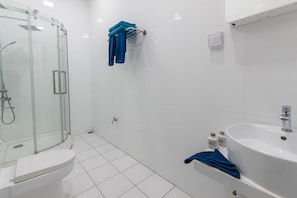 Shower, rainfall showerhead, designer toiletries, hair dryer