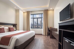 Deluxe Double Room | Premium bedding, in-room safe, individually decorated, desk - HM Grand Central Hotel (Phnom Penh)