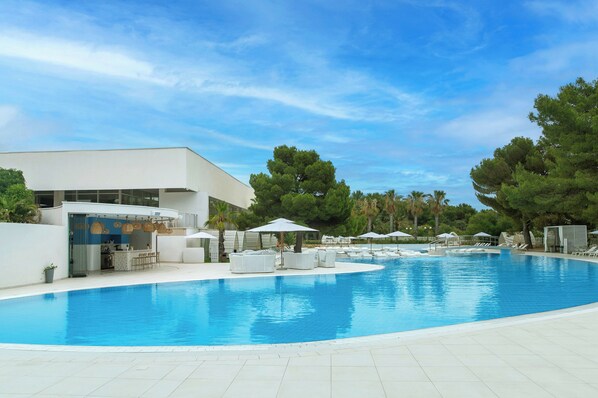 Indoor pool, outdoor pool, open 8:00 AM to 8:00 PM, pool loungers