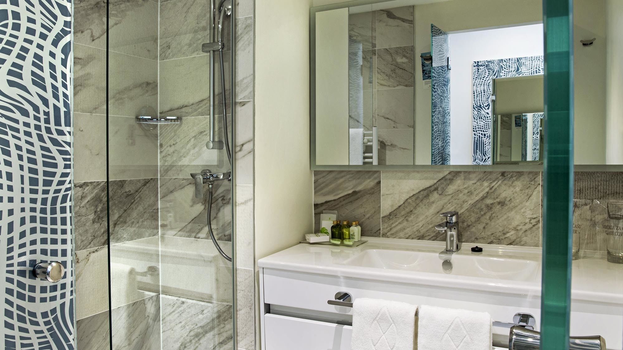 shower, free toiletries, hair dryer, bathrobes